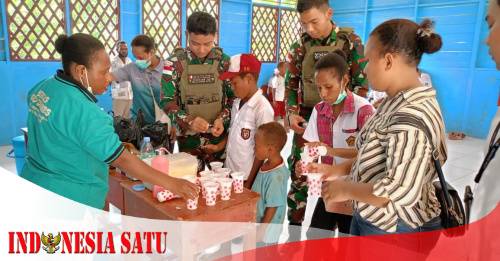 Satgas Yonif 144/Jaya Yudha Laksanakan Pemberian Obat Cacing